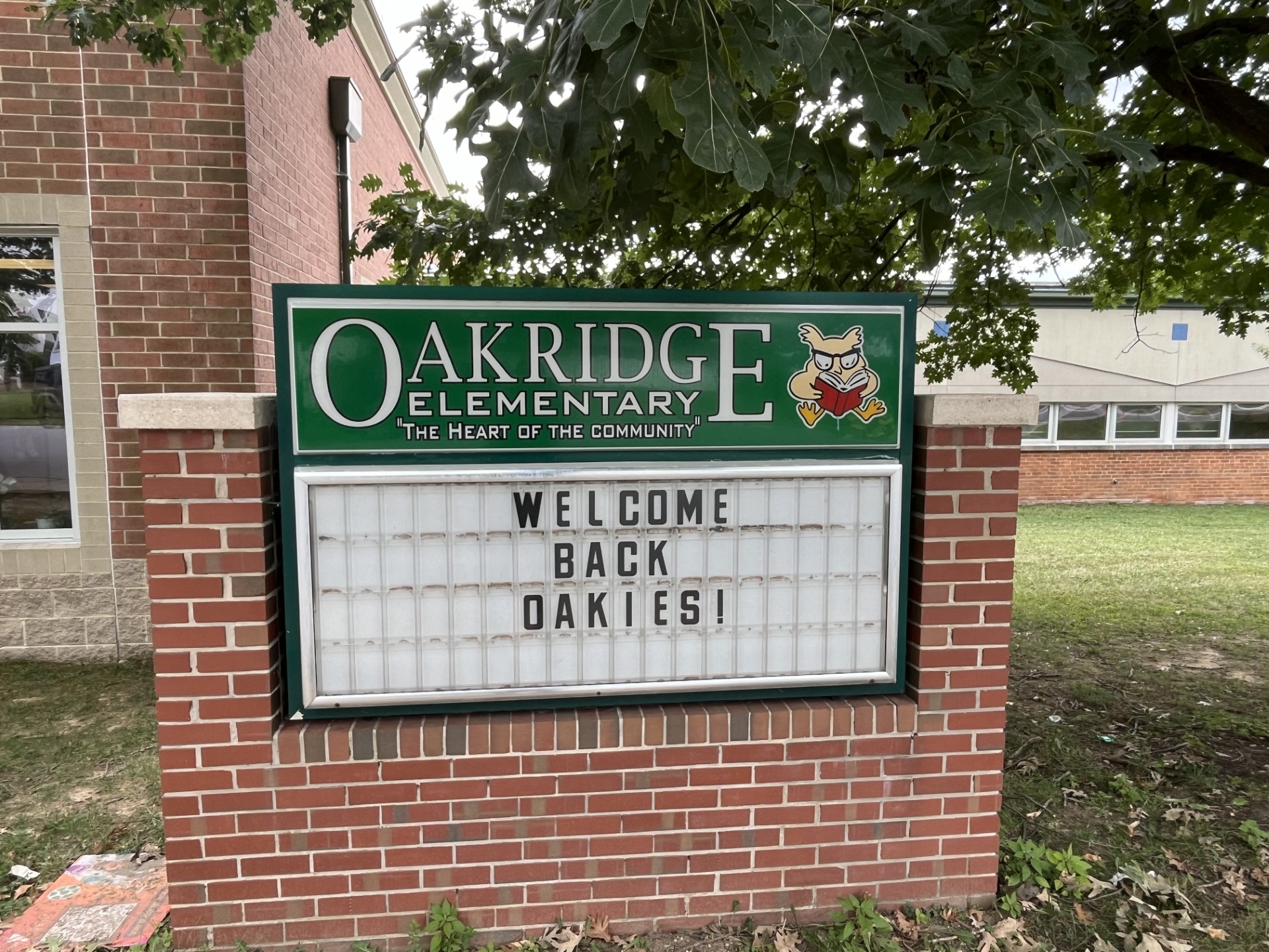 Large sign at the front of a school that welcomes the community to the new school year.